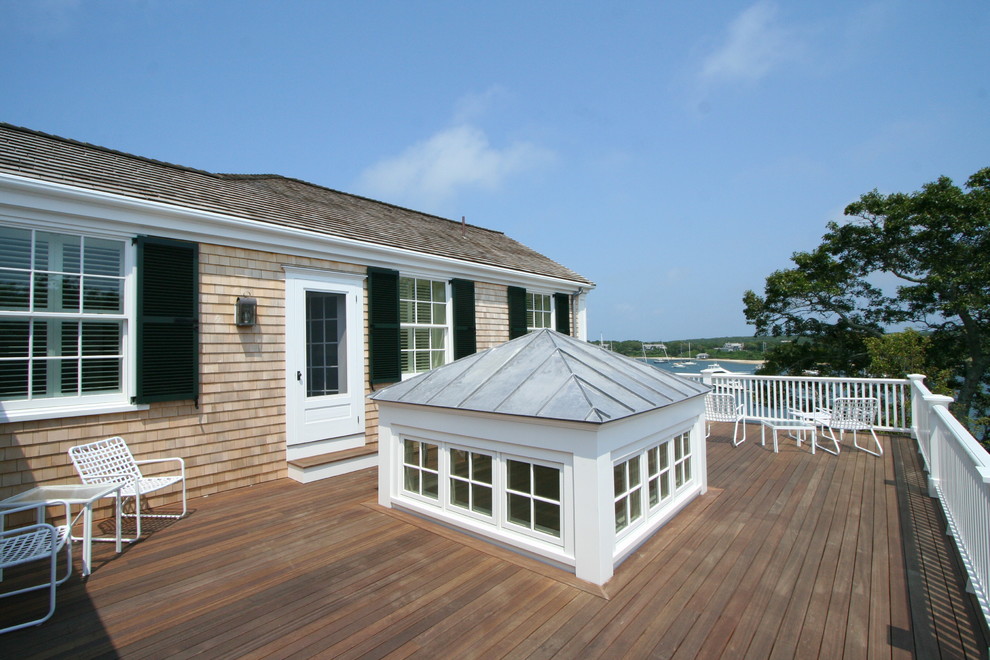 This is an example of a large beach style rooftop and rooftop deck in Boston with no cover.