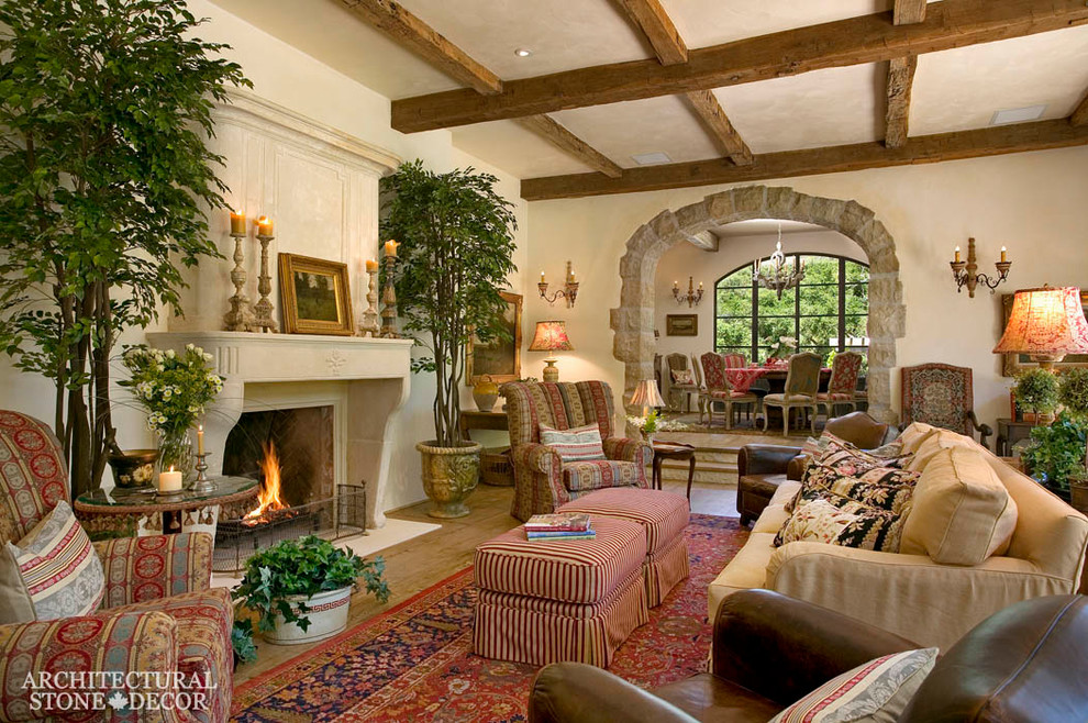 Large mediterranean open concept family room in Toronto with a standard fireplace and a stone fireplace surround.