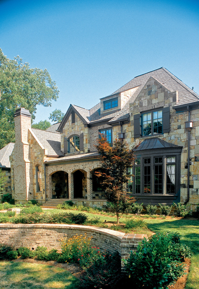 Design ideas for a traditional exterior in Atlanta with stone veneer.
