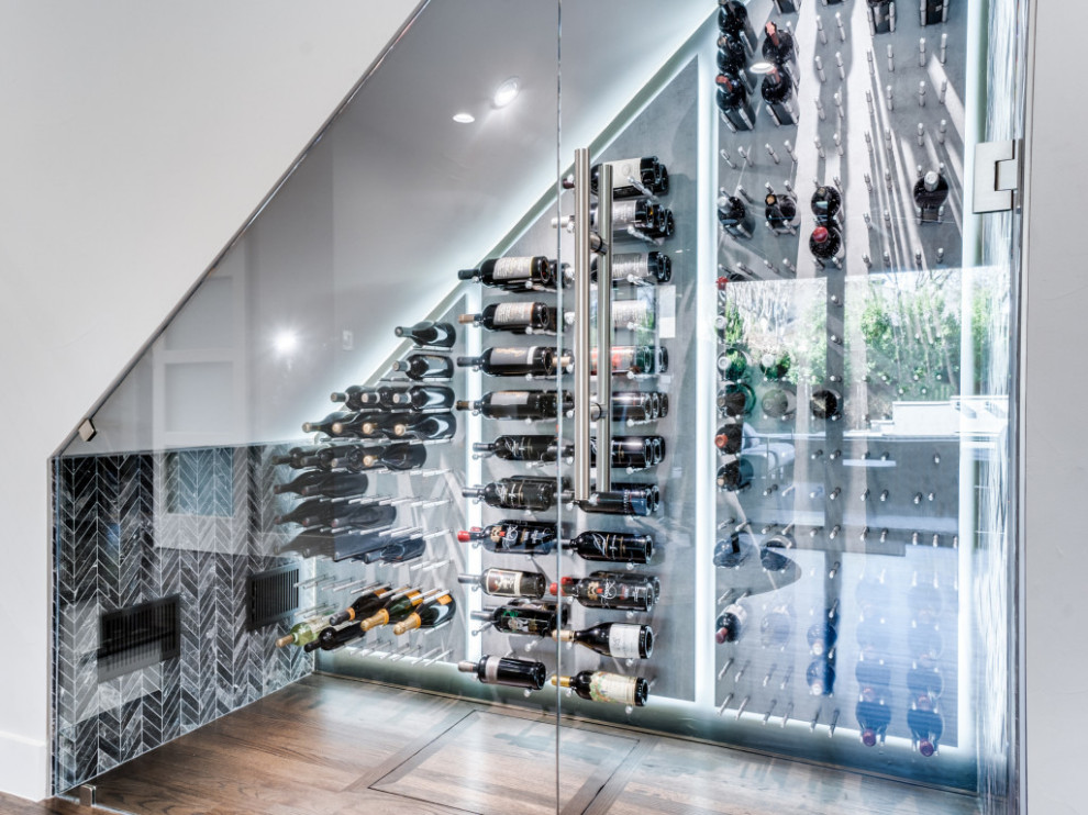 This is an example of a contemporary wine cellar in Dallas.