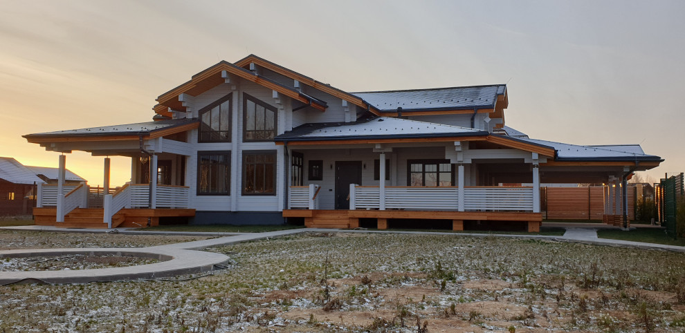 Дом из клееного бруса с навесом для машин 426 м.кв.