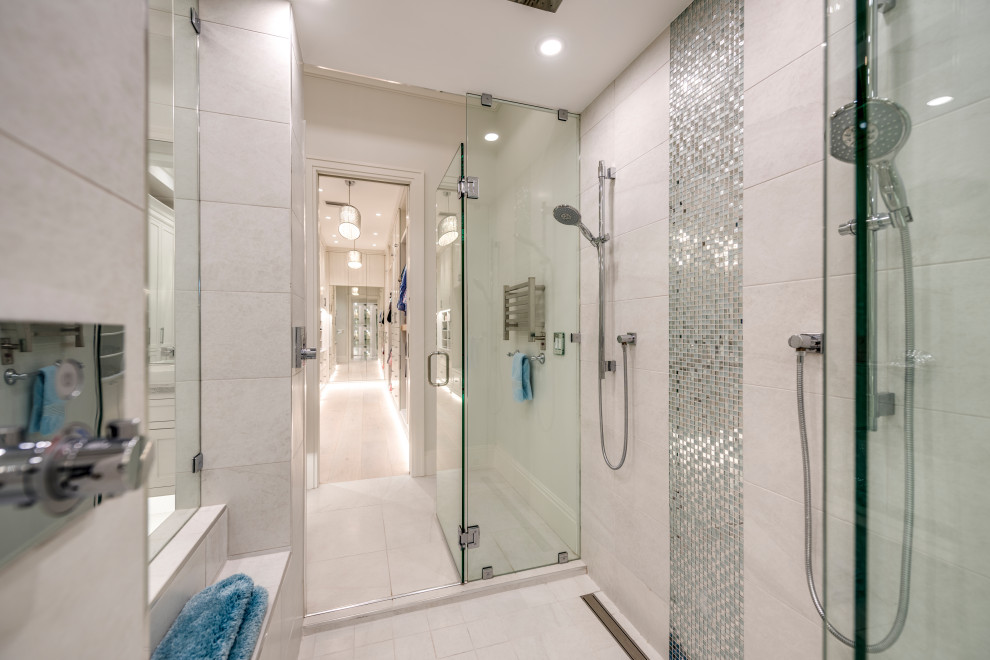 Freestanding bathtub - transitional master multicolored tile and glass tile porcelain tile, beige floor, double-sink and coffered ceiling freestanding bathtub idea with beaded inset cabinets, white cabinets, a two-piece toilet, white walls, a vessel sink, quartzite countertops, a hinged shower door, gray countertops and a floating vanity