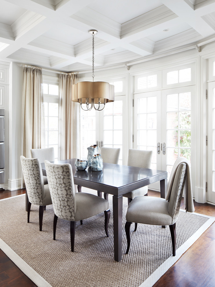 Photo of a traditional dining room in Dallas with white walls and dark hardwood floors.