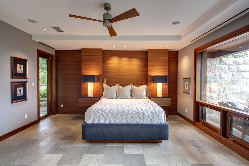 Inspiration for a contemporary master bedroom in Dallas with grey walls.