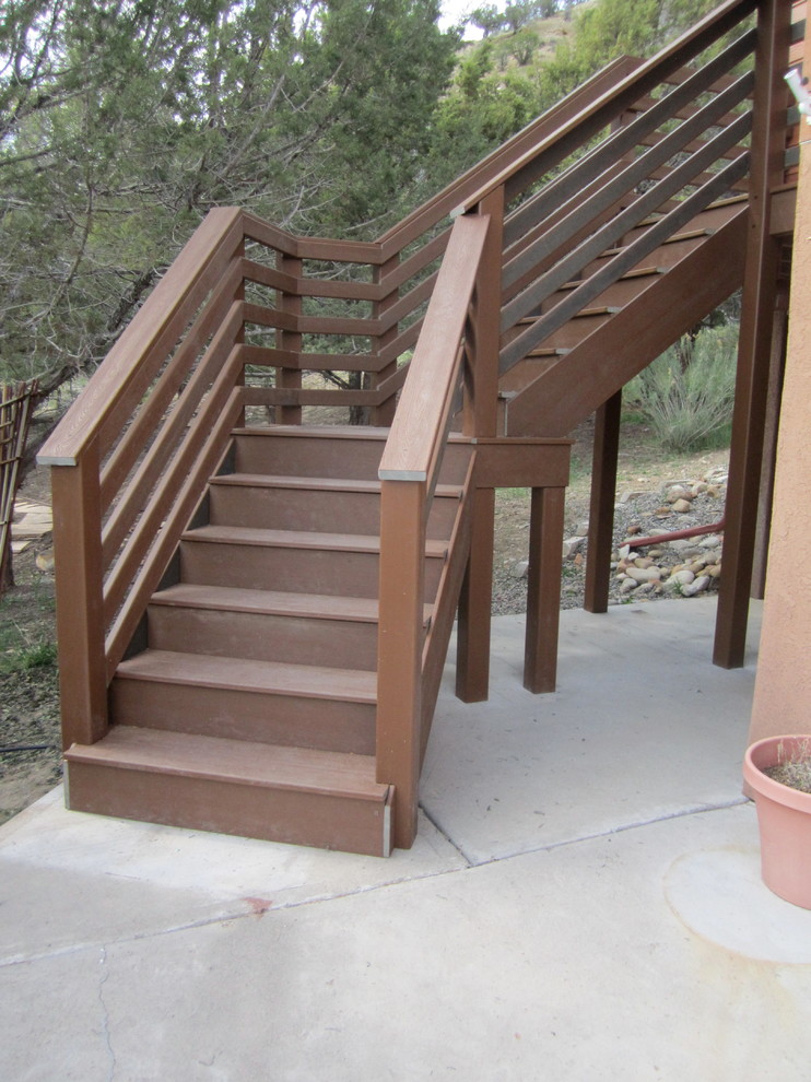 Inspiration for a small transitional straight staircase remodel in Denver