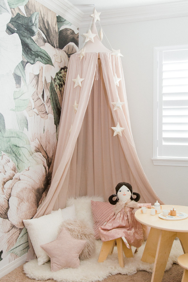 Design ideas for a scandinavian kids' bedroom for girls in San Diego with white walls, carpet and brown floor.