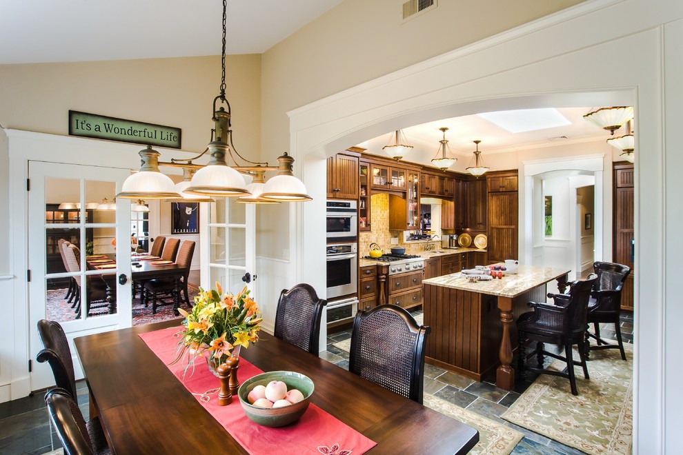 Photo of a traditional kitchen/dining combo in Boston with beige walls.