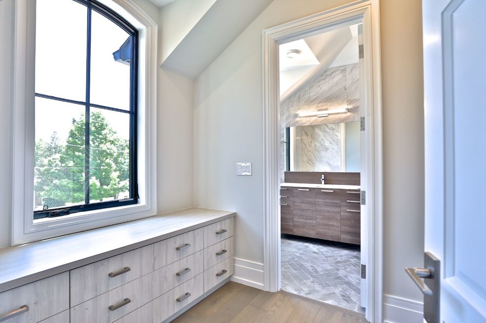 Design ideas for an expansive modern bathroom in Toronto with flat-panel cabinets, white cabinets, a drop-in tub, a curbless shower, white tile, ceramic tile, beige walls, medium hardwood floors, engineered quartz benchtops, beige floor and yellow benchtops.