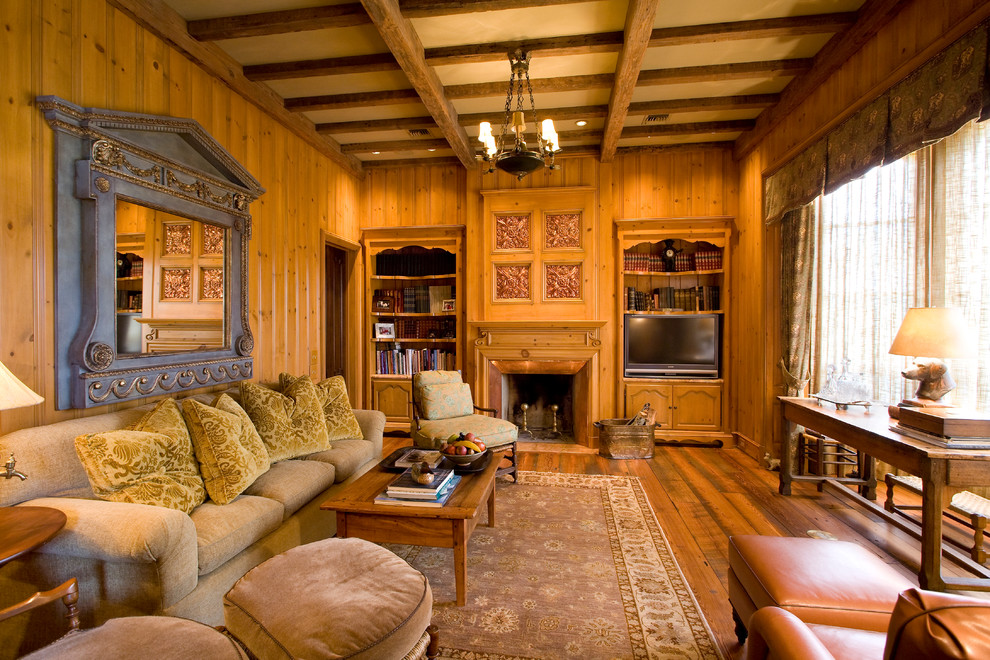 Design ideas for a traditional family room in Other with a library.