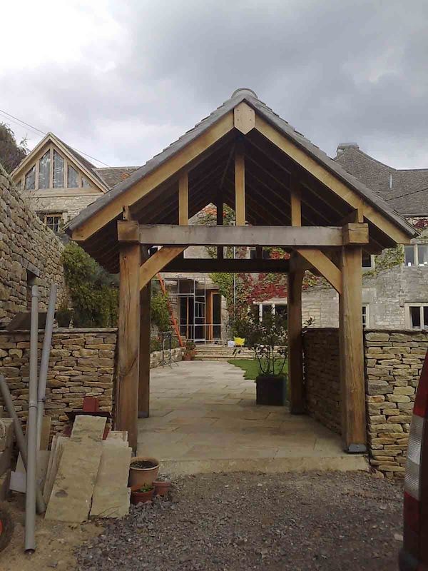 Inspiration for a mid-sized traditional one-storey exterior in Gloucestershire with wood siding.