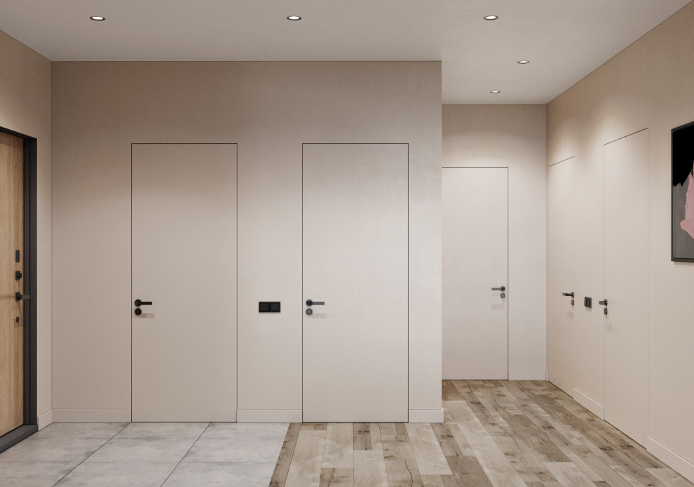This is an example of a mid-sized scandinavian front door in Other with beige walls, porcelain floors, a single front door, a medium wood front door and grey floor.