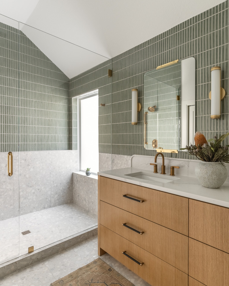 Bathroom - contemporary master green tile and ceramic tile terrazzo floor, gray floor and double-sink bathroom idea in Austin with medium tone wood cabinets, white walls, an undermount sink, quartz countertops, a hinged shower door, white countertops and a freestanding vanity