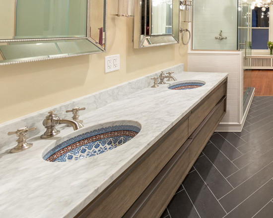 Inspiration for a large transitional master bathroom in Chicago with flat-panel cabinets, dark wood cabinets, a freestanding tub, a double shower, a two-piece toilet, multi-coloured tile, ceramic tile, beige walls, ceramic floors, an undermount sink and solid surface benchtops.