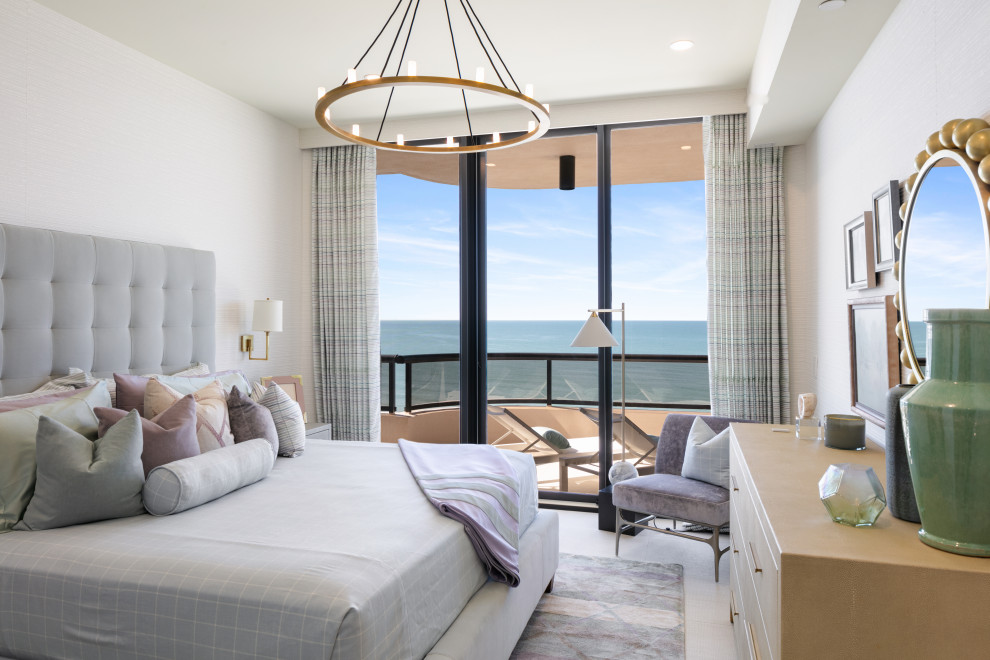 Mid-sized eclectic guest bedroom in Tampa with beige walls, porcelain floors, beige floor and wallpaper.