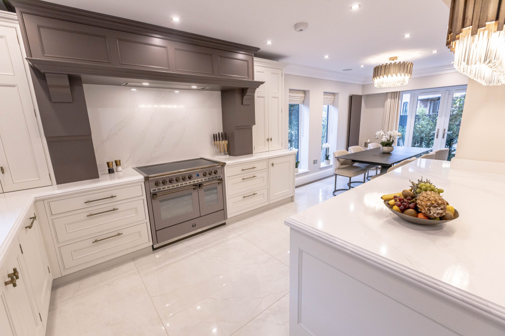 Mid-sized contemporary kitchen in Other with granite benchtops, white splashback, granite splashback, white appliances, with island and white benchtop.