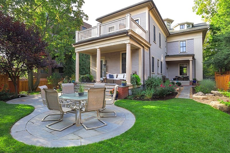 Design ideas for a large contemporary full sun backyard stone formal garden in Boston.