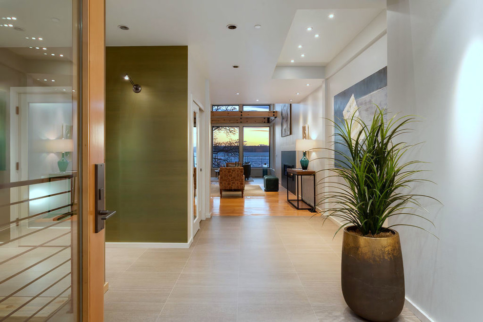 Design ideas for a mid-sized modern hallway in Seattle with white walls, porcelain floors, beige floor and coffered.
