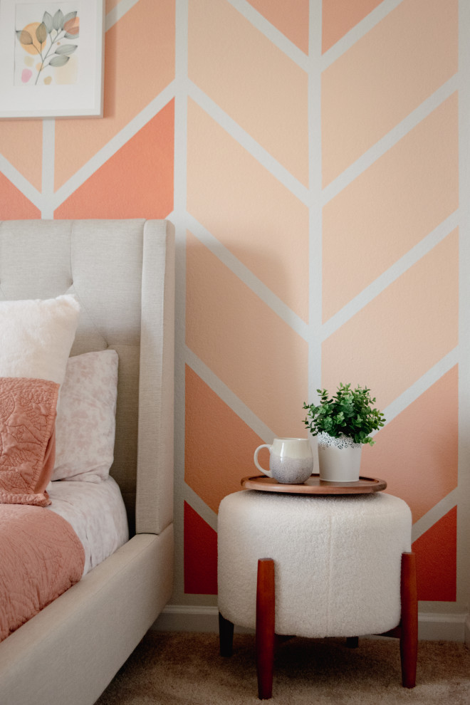 Design ideas for a small retro guest bedroom in Charlotte with multi-coloured walls, carpet, beige floors and wallpapered walls.