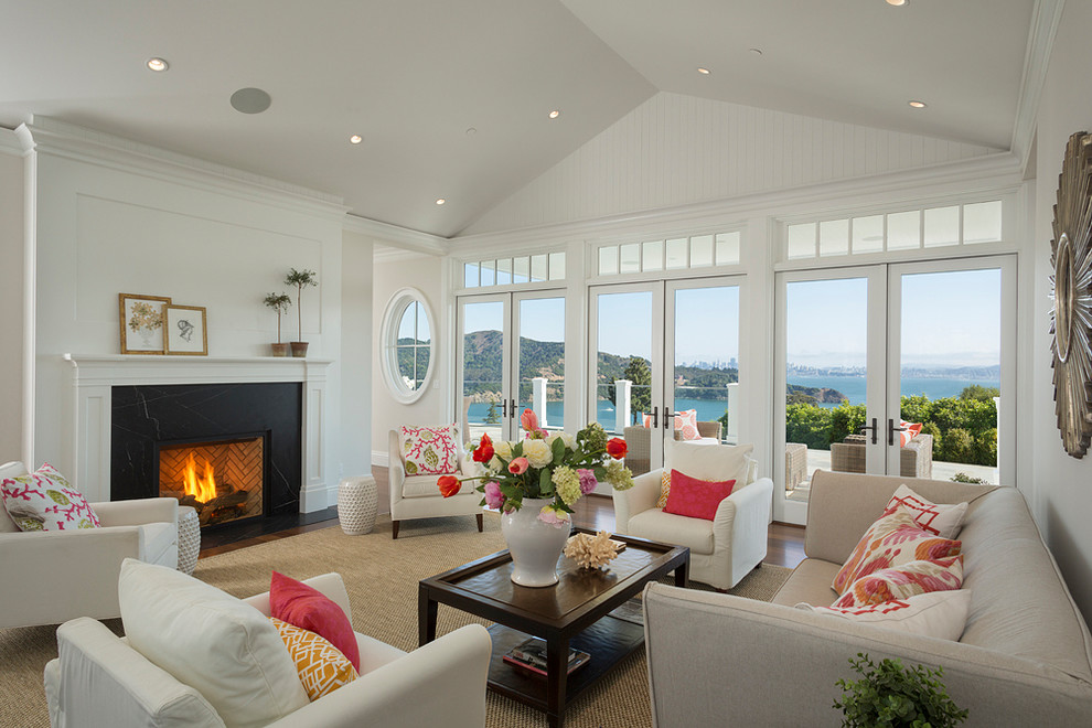 Inspiration for a beach style formal living room in San Francisco with white walls and a standard fireplace.