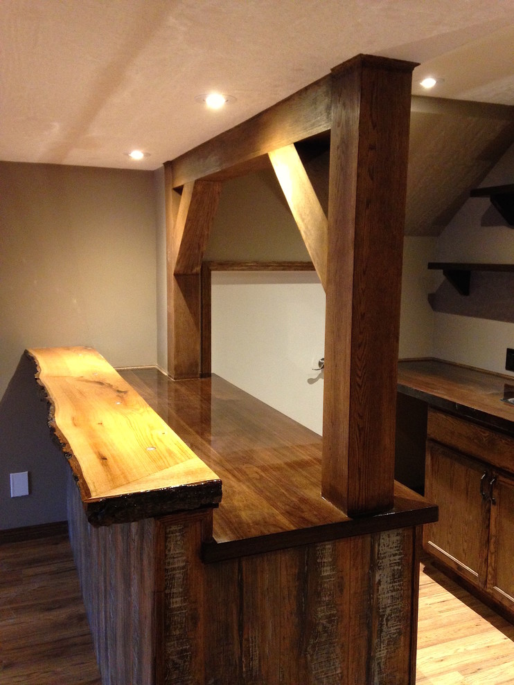 Mountain style home design photo in Calgary