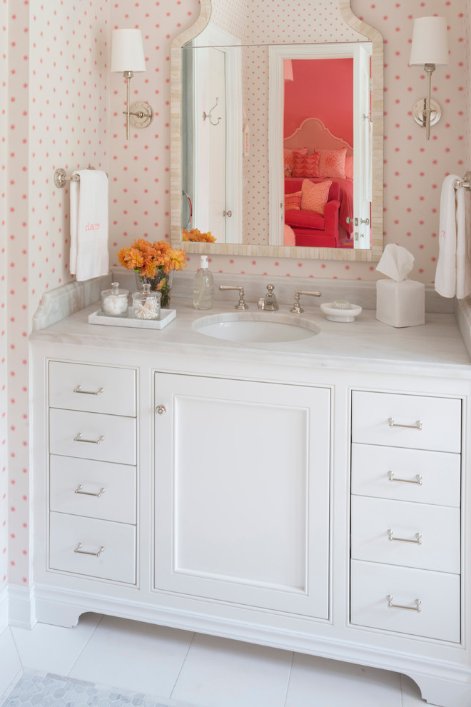 Inspiration for a mid-sized kids bathroom in Jacksonville with beaded inset cabinets, white cabinets, white tile, multi-coloured walls, a drop-in sink and soapstone benchtops.
