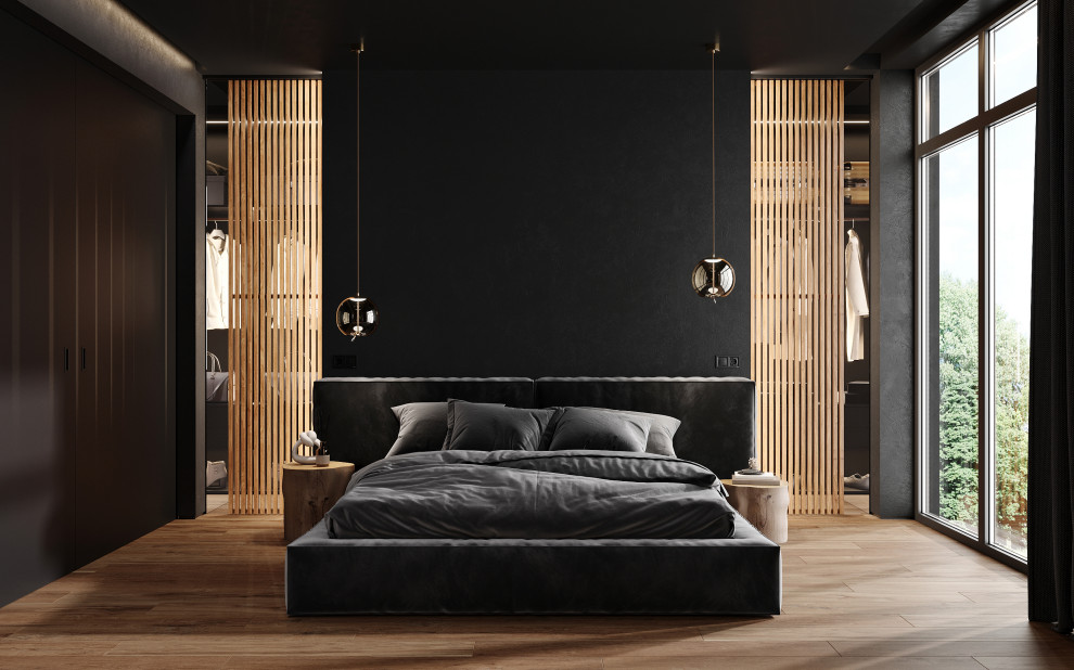 他の地域にある巨大なコンテンポラリースタイルのおしゃれな主寝室 (黒い壁、無垢フローリング、茶色い床) のレイアウト