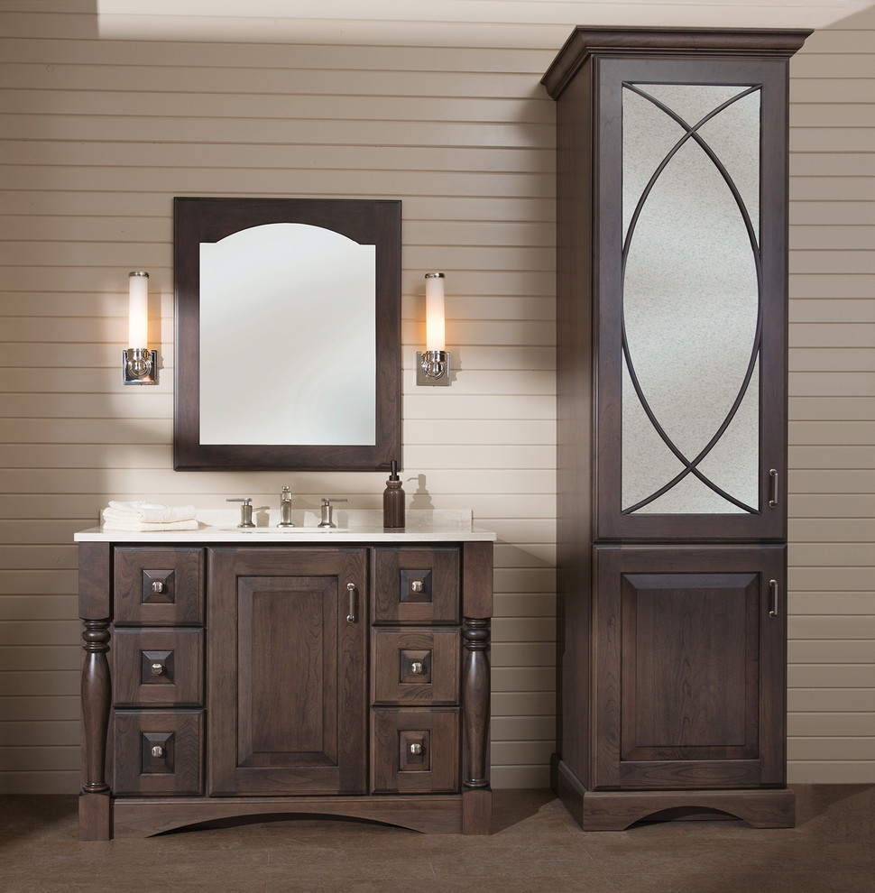 Design ideas for a mid-sized traditional 3/4 bathroom in Wilmington with an undermount sink, dark wood cabinets, solid surface benchtops, beige tile, beige walls, cork floors, brown floor, white benchtops and furniture-like cabinets.