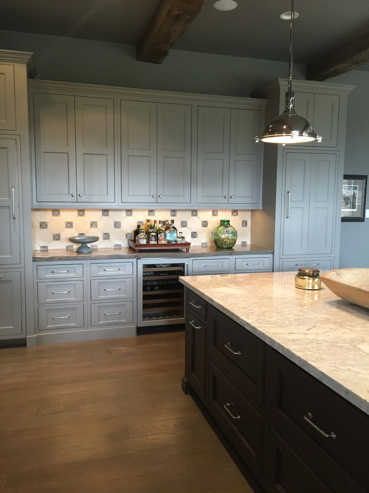 Photo of a transitional u-shaped eat-in kitchen in Austin with beaded inset cabinets and with island.