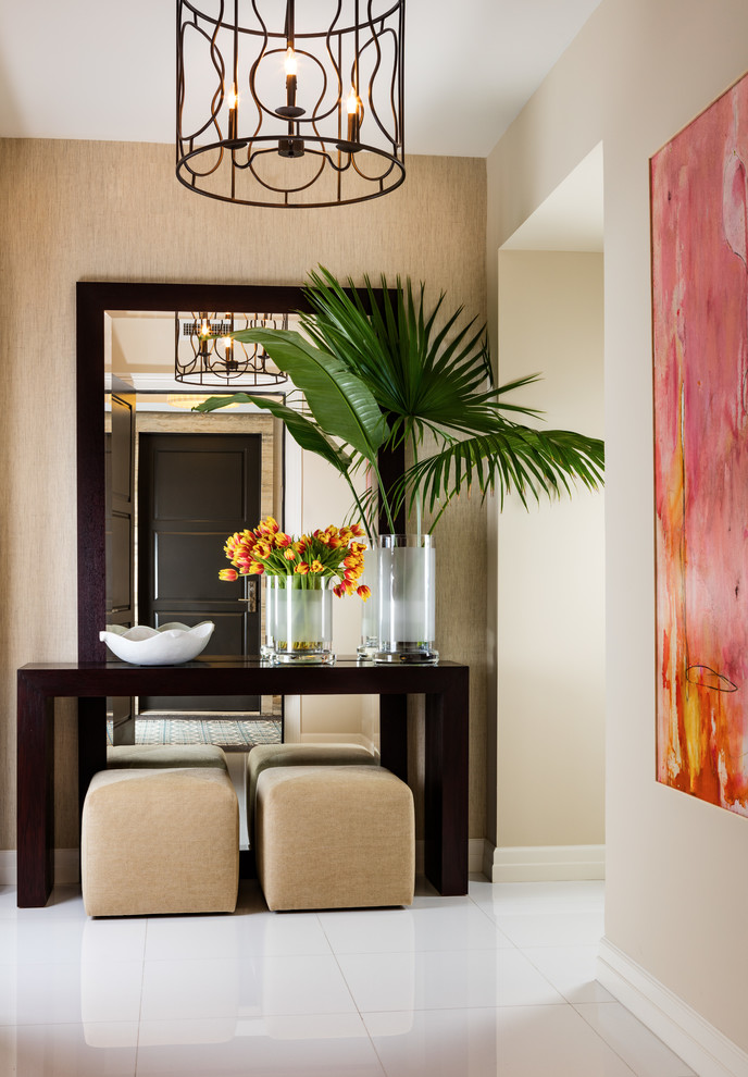 Mid-sized transitional white floor foyer photo in Miami with beige walls and a brown front door