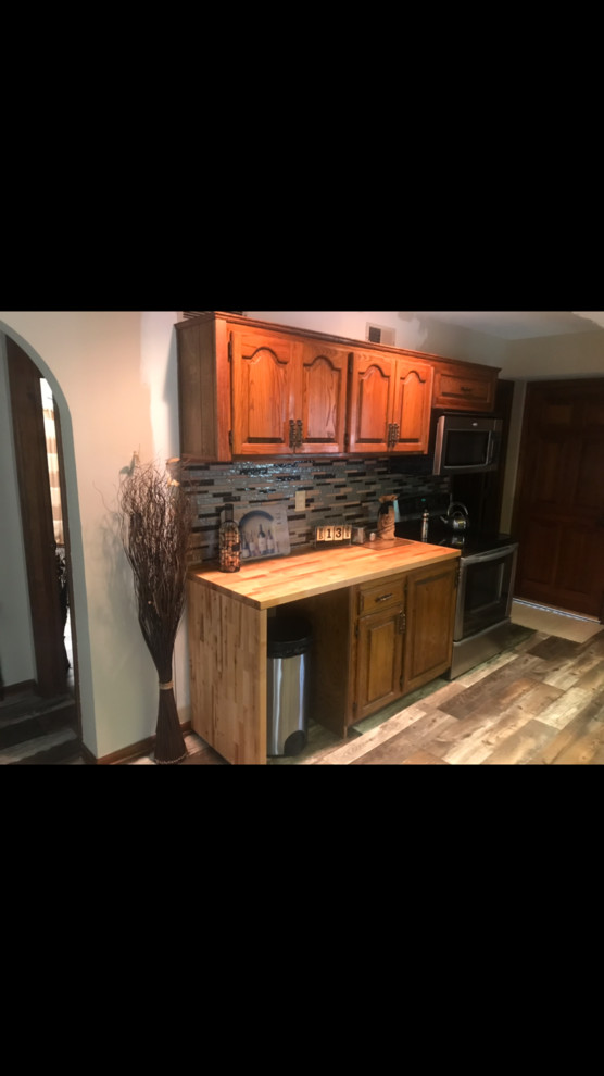 Example of a mountain style kitchen design in Denver
