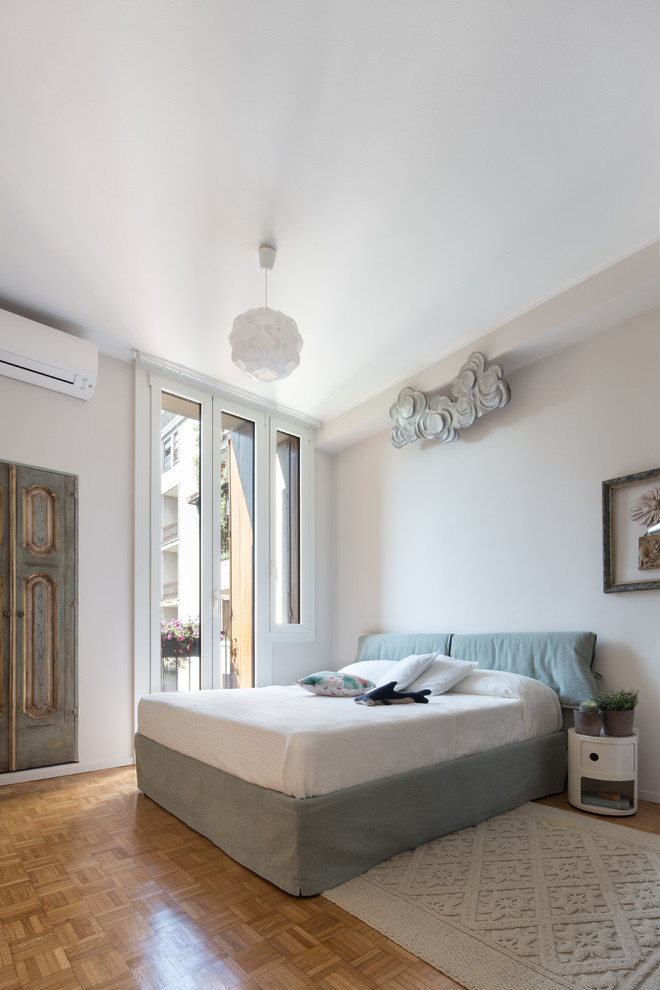 Inspiration for an eclectic bedroom remodel in Milan