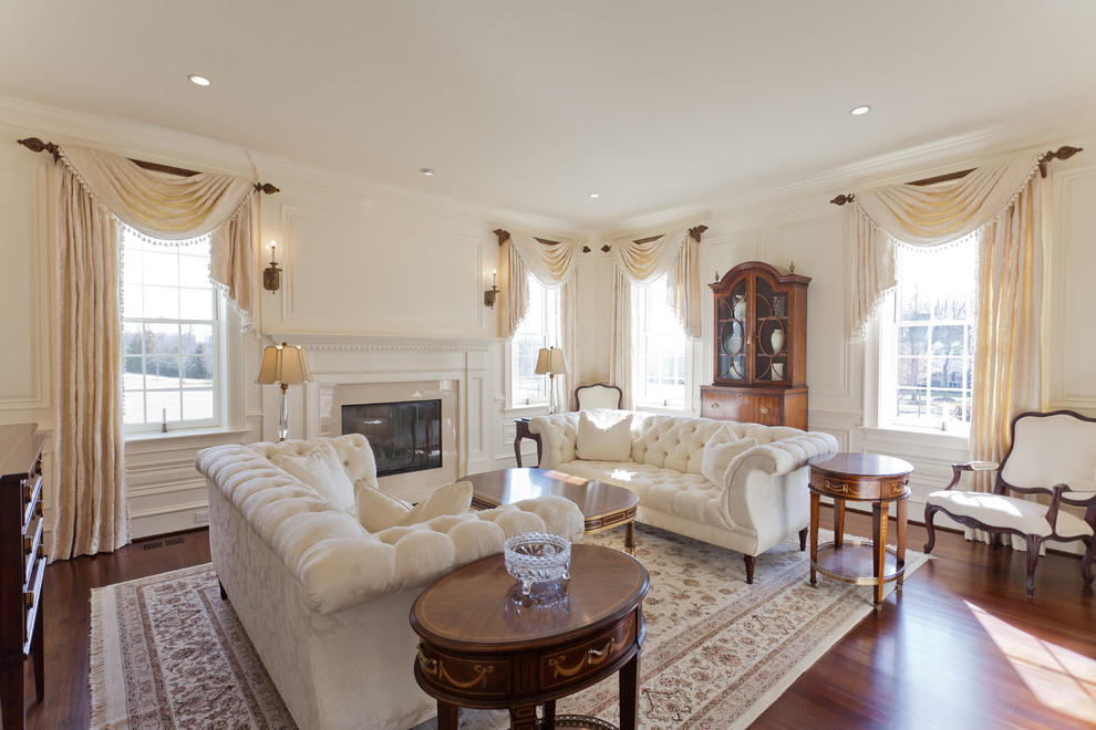 Design ideas for a traditional formal living room in Philadelphia with beige walls and a standard fireplace.
