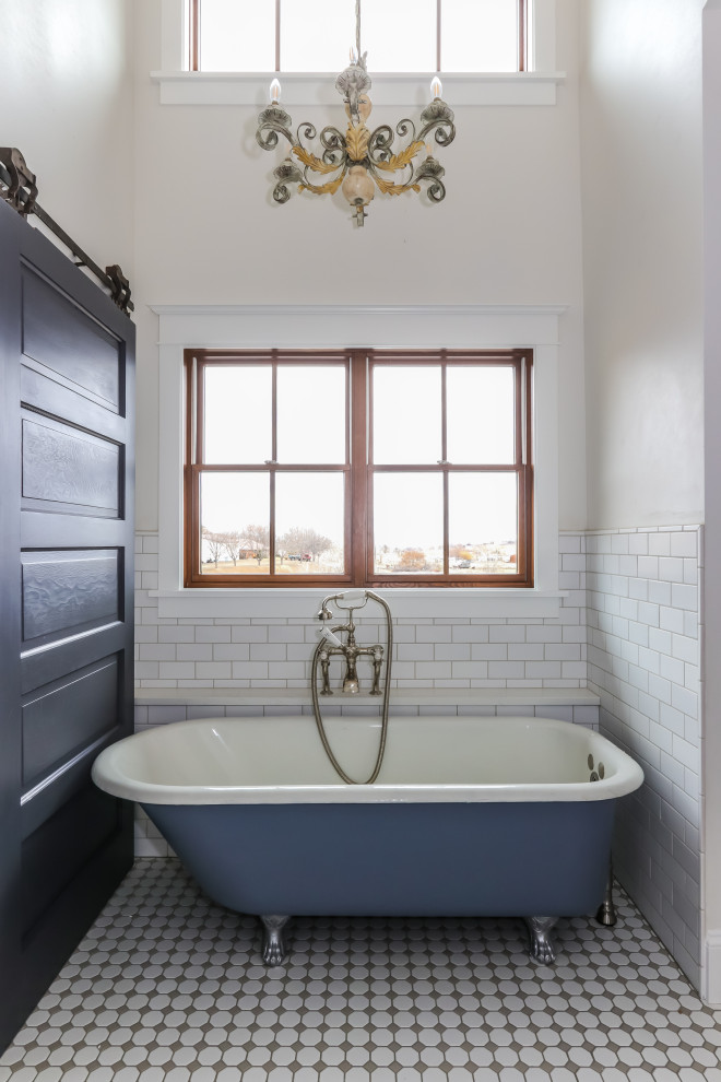 Photo of a large country master bathroom in Seattle with shaker cabinets, light wood cabinets, a claw-foot tub, a curbless shower, a two-piece toilet, white tile, subway tile, white walls, porcelain floors, an undermount sink, engineered quartz benchtops, white floor, a shower curtain and white benchtops.