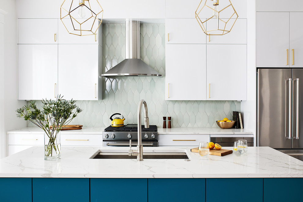 Inspiration for a contemporary galley kitchen in DC Metro with flat-panel cabinets, turquoise cabinets, green splashback, stainless steel appliances, with island, white benchtop and an undermount sink.