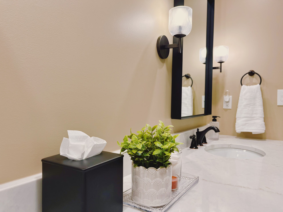 Example of a mid-sized transitional master ceramic tile porcelain tile, beige floor and double-sink alcove shower design with shaker cabinets, dark wood cabinets, a two-piece toilet, beige walls, an undermount sink, quartz countertops, beige countertops and a built-in vanity