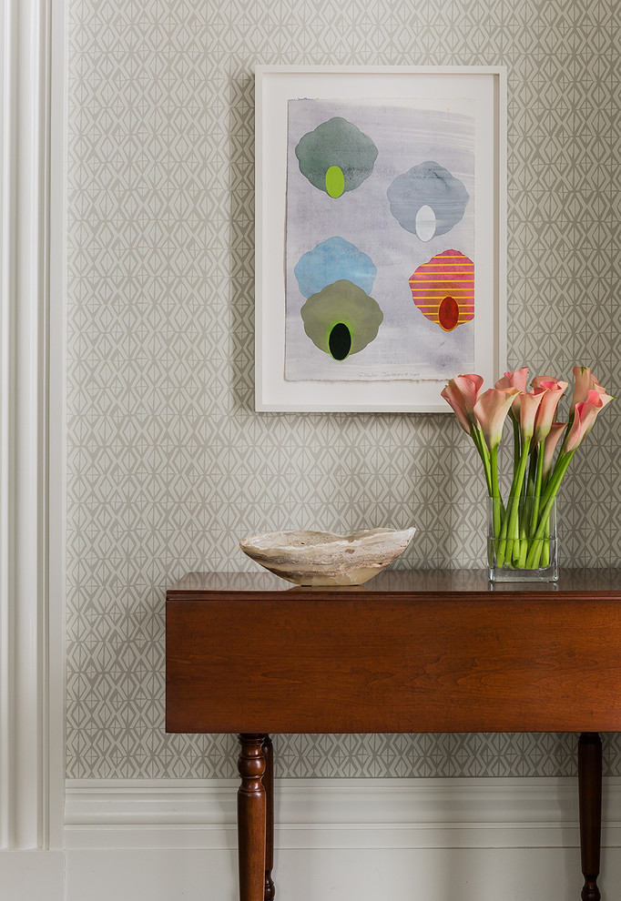 Example of a mid-sized transitional home design design in Boston