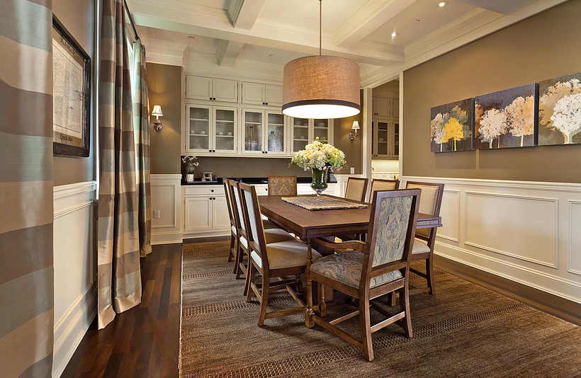Example of a mid-sized transitional dark wood floor and brown floor enclosed dining room design in Seattle with brown walls and no fireplace