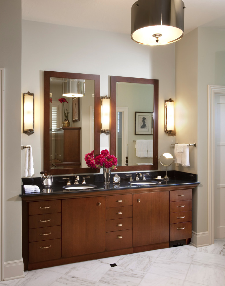 Inspiration for a large traditional master bathroom in Milwaukee with an undermount sink, flat-panel cabinets, dark wood cabinets, white tile, granite benchtops, white floor, marble floors and grey walls.