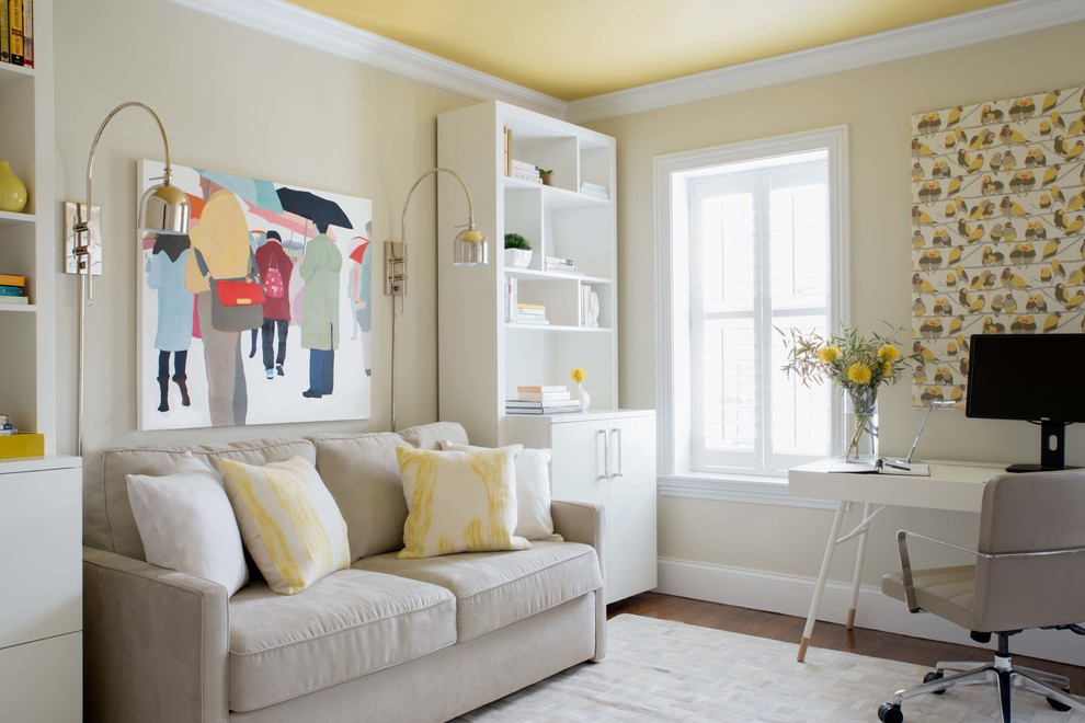 Inspiration for a transitional study room in Boston with yellow walls, dark hardwood floors and a freestanding desk.