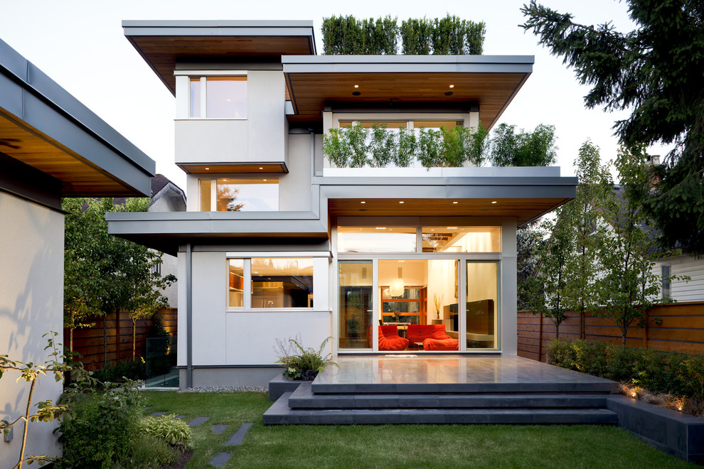 Design ideas for a contemporary two-storey exterior in Other.