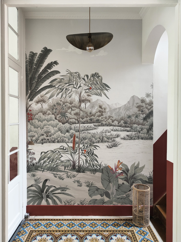 Inspiration for a mid-sized transitional foyer in Lille with red walls.