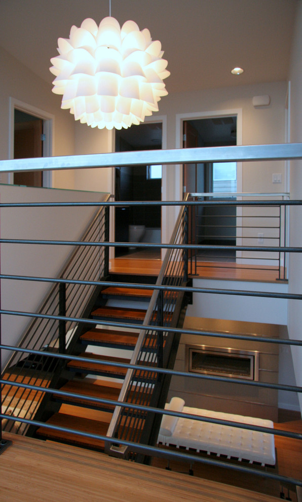 Photo of a modern wood staircase in Seattle.