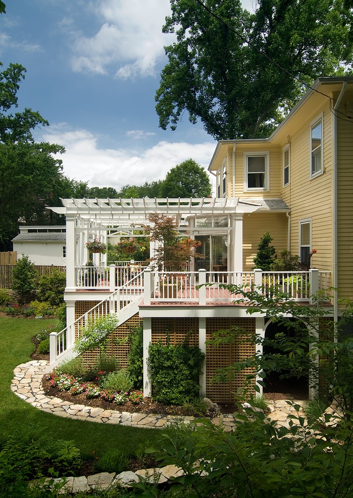 Inspiration for a traditional verandah in DC Metro with a pergola.