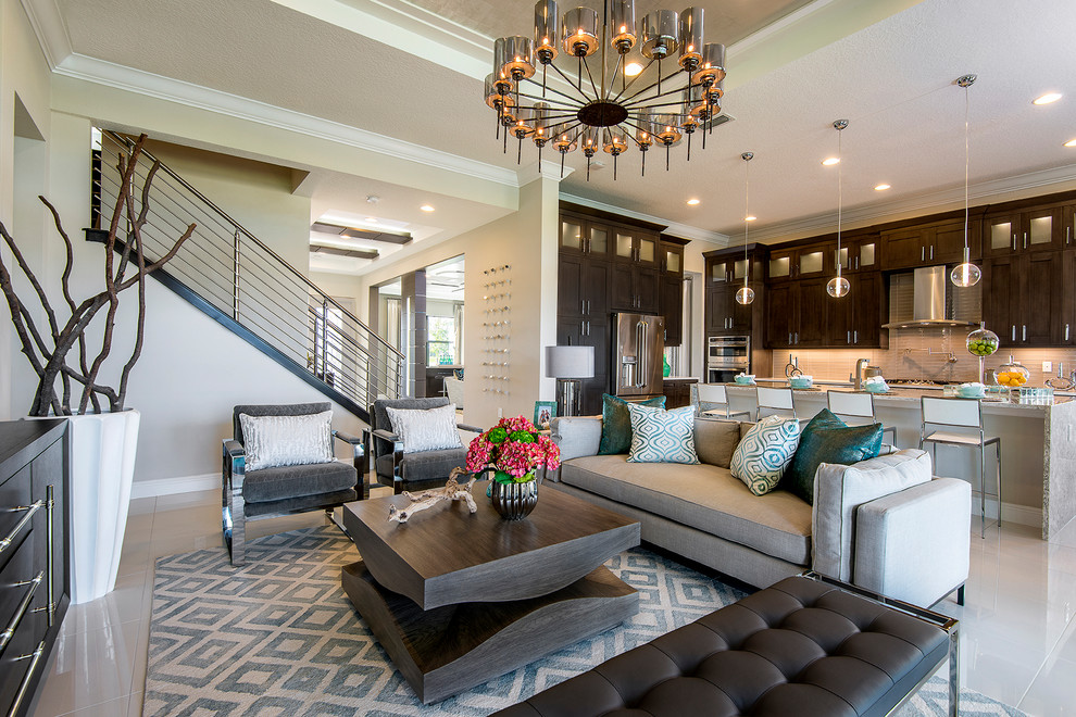 Large contemporary open concept living room in Tampa with beige walls, grey floor and coffered.