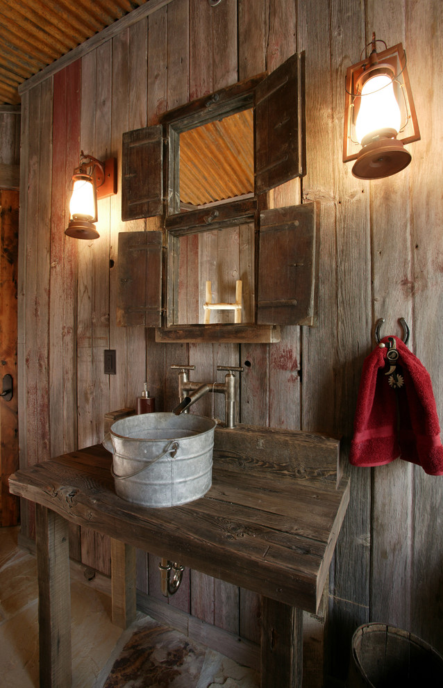 Inspiration for a country powder room in Denver with a vessel sink, wood benchtops and brown benchtops.