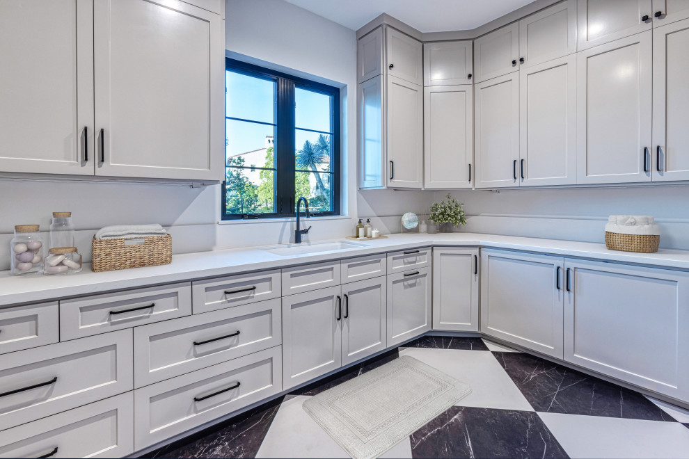 White Shaker Cabinets & Black-Framed Window Laundry Room | French Country Transi