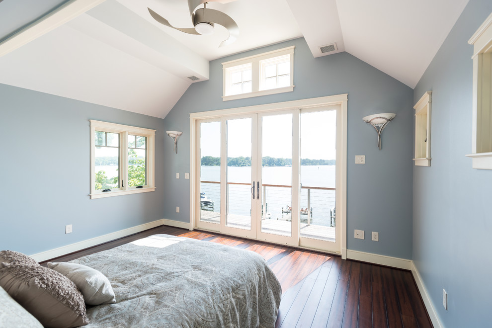 Design ideas for a small guest bedroom in Baltimore with blue walls and bamboo floors.