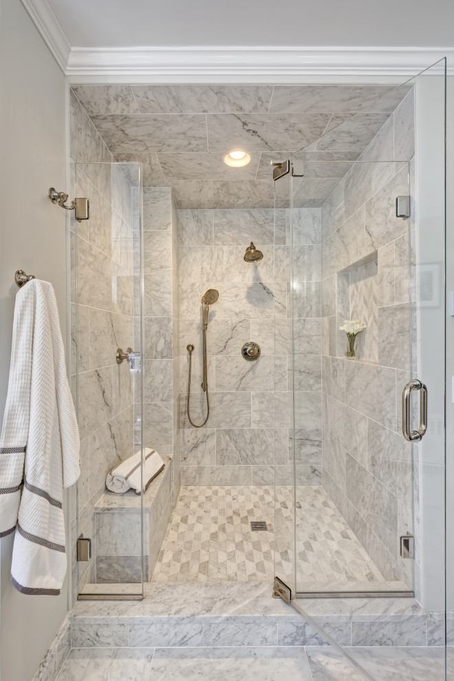 This is an example of a large transitional master bathroom in New York with shaker cabinets, grey cabinets, an alcove shower, a one-piece toilet, multi-coloured tile, marble, grey walls, marble floors, an undermount sink, engineered quartz benchtops, multi-coloured floor, a hinged shower door, grey benchtops, an enclosed toilet, a double vanity and a built-in vanity.