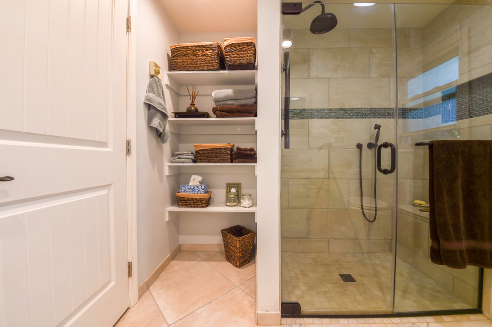 Inspiration for a mid-sized transitional 3/4 bathroom in DC Metro with flat-panel cabinets, beige cabinets, an alcove shower, grey walls, porcelain floors, a vessel sink, granite benchtops, beige floor, a hinged shower door and grey benchtops.