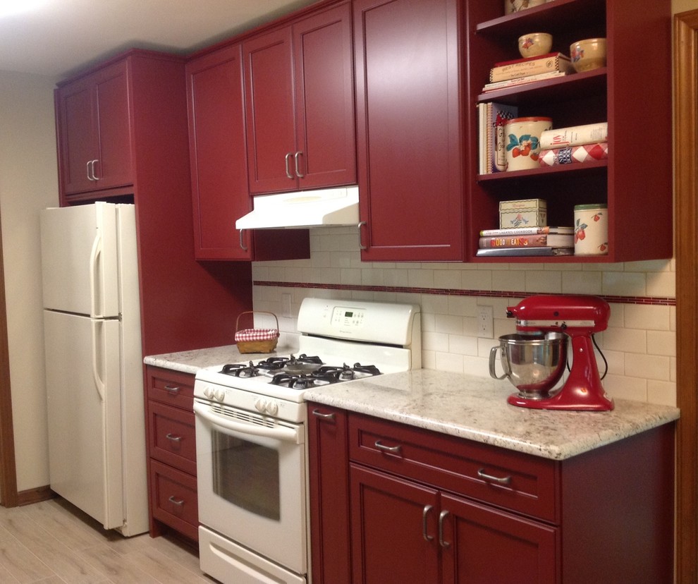 Mid-sized midcentury galley kitchen pantry in Raleigh with a double-bowl sink, flat-panel cabinets, red cabinets, granite benchtops, white splashback, glass tile splashback, white appliances, ceramic floors and no island.